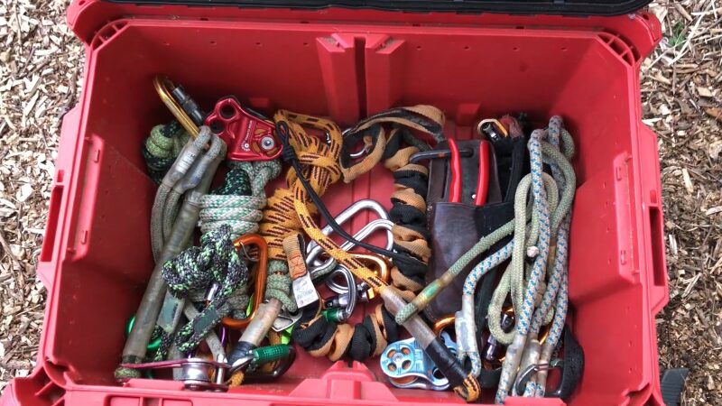 A Red Toolbox Filled with Various Rigging Equipment